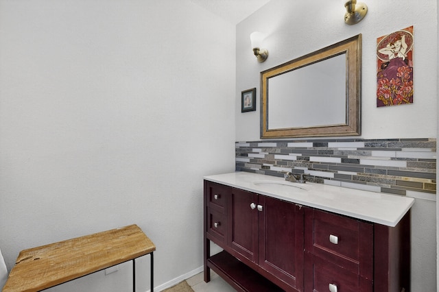 700 Fruit Ave NW Unit G, Albuquerque, NM 87102 - bathroom featuring vanity and decorative backsplash