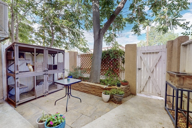 700 Fruit Ave NW Unit G, Albuquerque, NM 87102 - view of patio featuring a gate