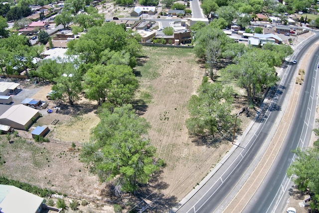 541 Atrisco Dr NW, Albuquerque, NM 87105 - aerial overview of property's location with nearby suburban area and a major roadway