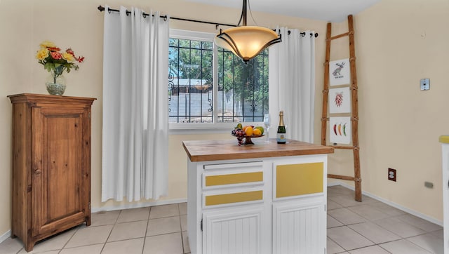 13101 Comanche Rd NE, Albuquerque, NM 87111 - dining area with light tile patterned floors and baseboards