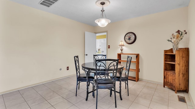 13101 Comanche Rd NE, Albuquerque, NM 87111 - dining area featuring light tile patterned floors and baseboards