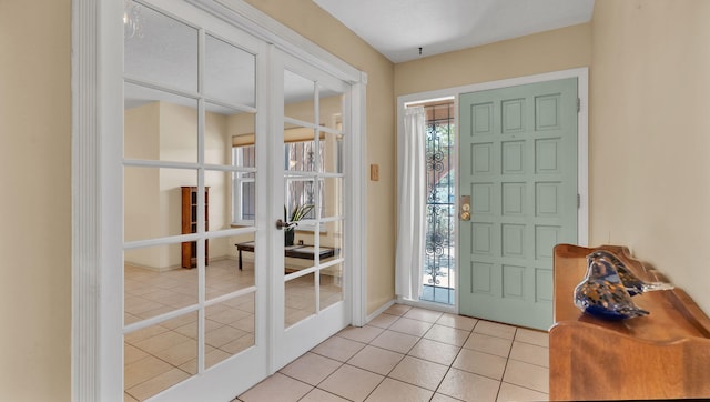 13101 Comanche Rd NE, Albuquerque, NM 87111 - foyer featuring french doors and light tile patterned floors