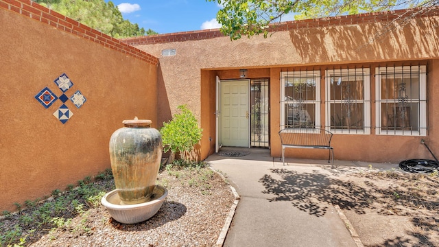 13101 Comanche Rd NE, Albuquerque, NM 87111 - property entrance with stucco siding
