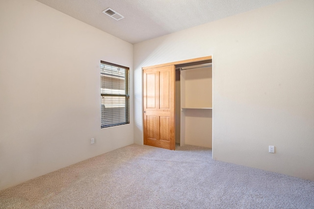 6615 Mountain Hawk Loop NE, Rio Rancho, NM 87144 - unfurnished bedroom with carpet and a closet