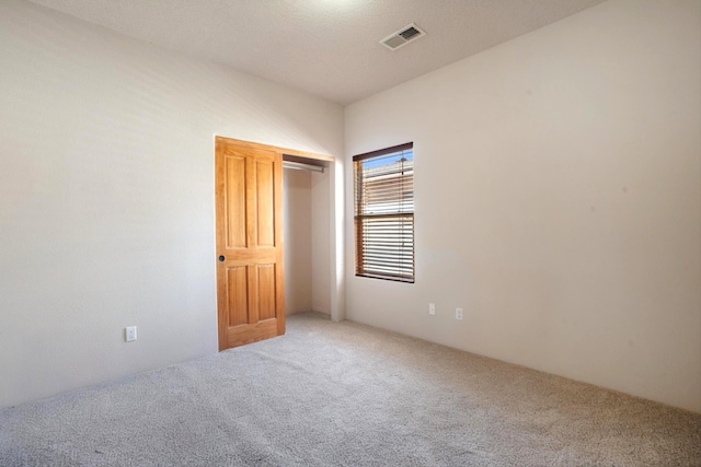 6615 Mountain Hawk Loop NE, Rio Rancho, NM 87144 - unfurnished bedroom with carpet flooring and a closet