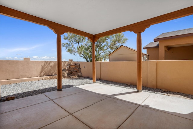6615 Mountain Hawk Loop NE, Rio Rancho, NM 87144 - fenced backyard with a patio