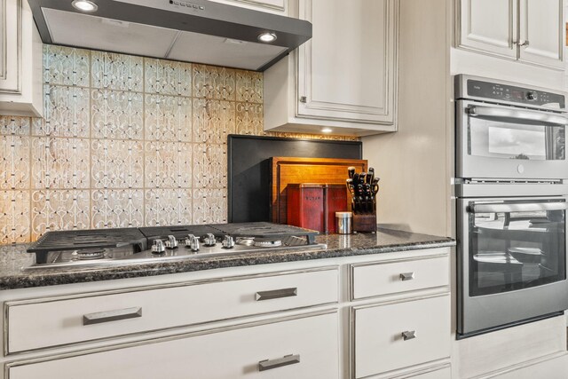 1524 W Meadowlark Ln, Corrales, NM 87048 - kitchen with ventilation hood, appliances with stainless steel finishes, and white cabinetry
