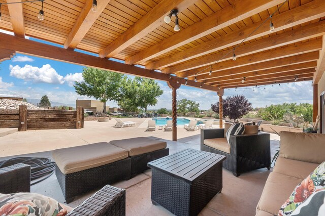 1524 W Meadowlark Ln, Corrales, NM 87048 - view of patio with an outdoor living space and an outdoor pool
