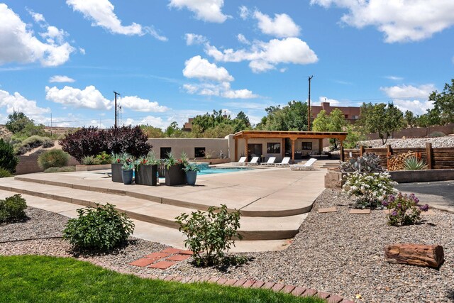 1524 W Meadowlark Ln, Corrales, NM 87048 - swimming pool featuring a patio area