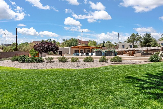1524 W Meadowlark Ln, Corrales, NM 87048 - view of grassy yard with a patio area and outdoor lounge area