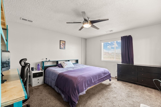 9909 Saddlehorn Trl SW, Albuquerque, NM 87121 - carpeted bedroom featuring a textured ceiling and ceiling fan