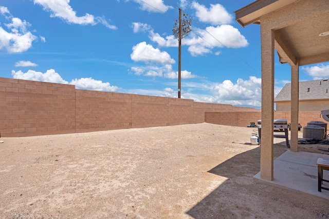 9909 Saddlehorn Trl SW, Albuquerque, NM 87121 - fenced backyard featuring a patio area