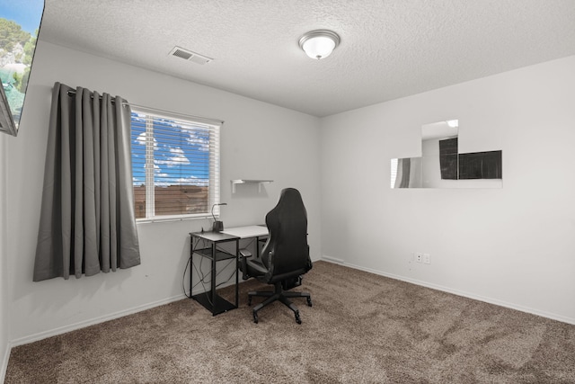 9909 Saddlehorn Trl SW, Albuquerque, NM 87121 - office area featuring a textured ceiling and carpet floors