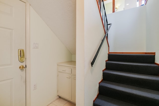 13527 Cedarbrook Ave NE, Albuquerque, NM 87111 - staircase featuring tile patterned floors
