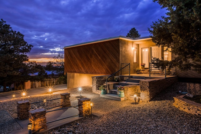 13527 Cedarbrook Ave NE, Albuquerque, NM 87111 - rear view of house with an outdoor fire pit