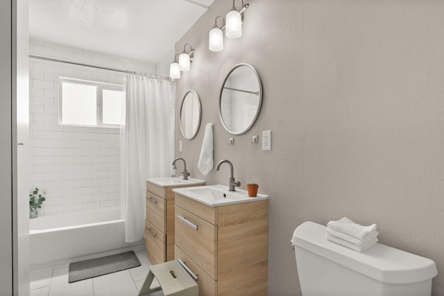 11608 Clifford Ave NE, Albuquerque, NM 87112 - bathroom featuring shower / bathtub combination with curtain, vanity, and tile patterned flooring