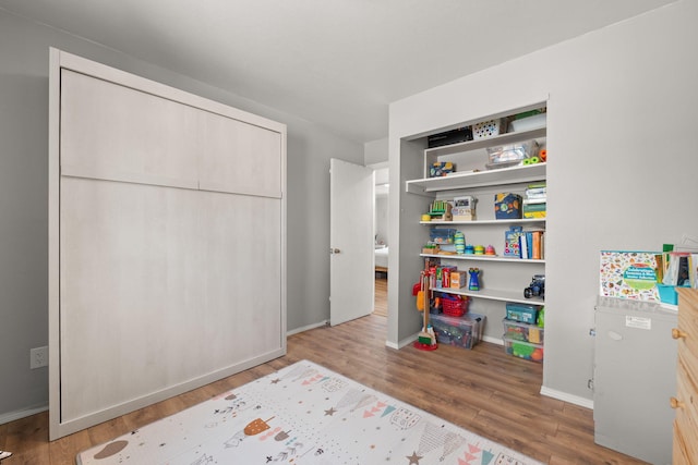 11608 Clifford Ave NE, Albuquerque, NM 87112 - bedroom featuring wood finished floors