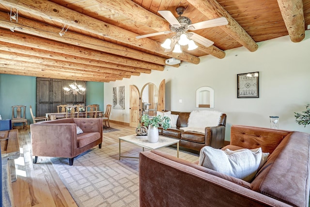276 Trosello Ln, Corrales, NM 87048 - living area featuring a wooden ceiling with exposed beams, a chandelier, arched walkways, ceiling fan, and light wood-style flooring
