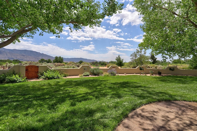276 Trosello Ln, Corrales, NM 87048 - view of yard with a gate and a mountain view