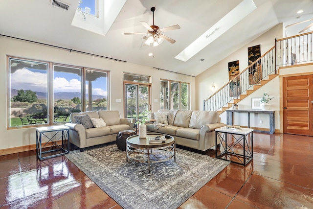 276 Trosello Ln, Corrales, NM 87048 - living area with a skylight, plenty of natural light, stairway, ceiling fan, and high vaulted ceiling