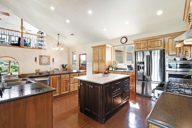 276 Trosello Ln, Corrales, NM 87048 - kitchen with stainless steel appliances, a center island, a ceiling fan, high vaulted ceiling, and dark countertops