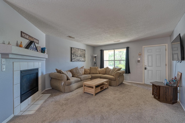 10405 Red Robin Rd SW, Albuquerque, NM 87121 - living room with a textured ceiling, light colored carpet, and a fireplace