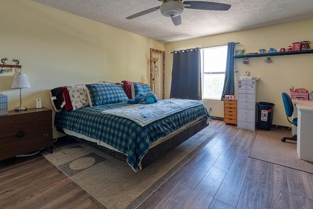 10405 Red Robin Rd SW, Albuquerque, NM 87121 - bedroom with a textured ceiling, wood finished floors, and ceiling fan