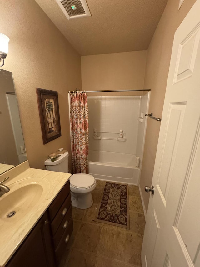 6356 Azaleas Rd NW, Albuquerque, NM 87114 - full bath featuring a textured ceiling, vanity, shower / tub combo with curtain, and tile patterned floors
