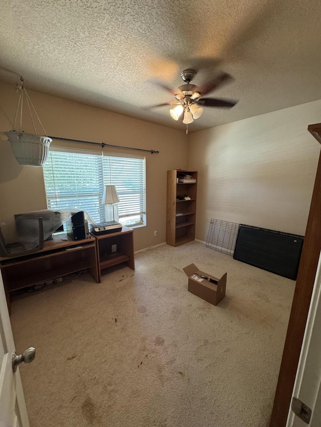 6356 Azaleas Rd NW, Albuquerque, NM 87114 - carpeted home office featuring a ceiling fan and a textured ceiling