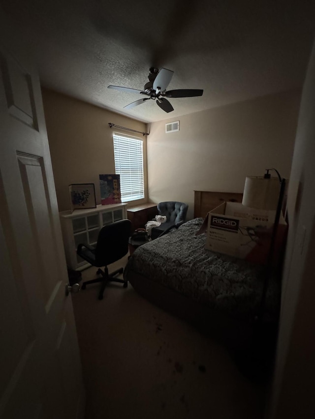 6356 Azaleas Rd NW, Albuquerque, NM 87114 - bedroom featuring ceiling fan, carpet flooring, and a textured ceiling