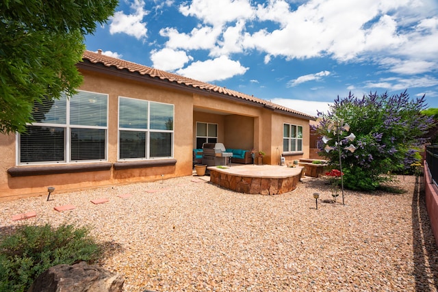3726 Linda Vista Ave NE, Rio Rancho, NM 87124 - rear view of property with stucco siding, a patio area, a tiled roof, and outdoor lounge area