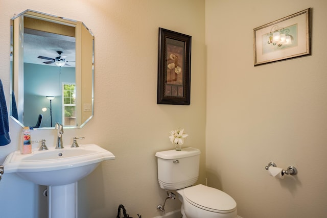 3726 Linda Vista Ave NE, Rio Rancho, NM 87124 - bathroom with toilet and a ceiling fan