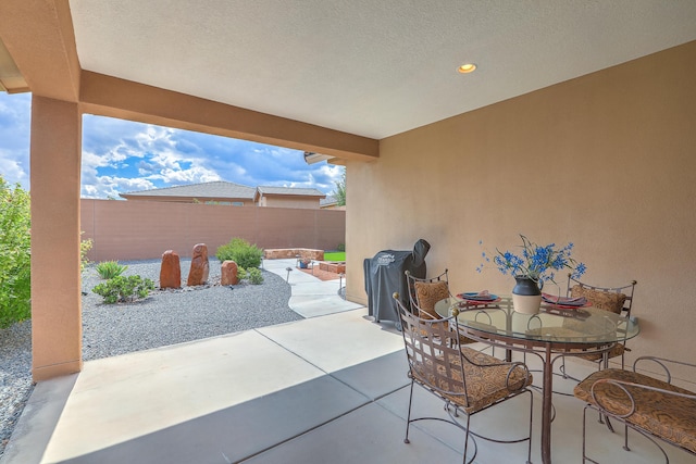 2952 Kings Canyon Loop NE, Rio Rancho, NM 87144 - fenced backyard featuring a patio