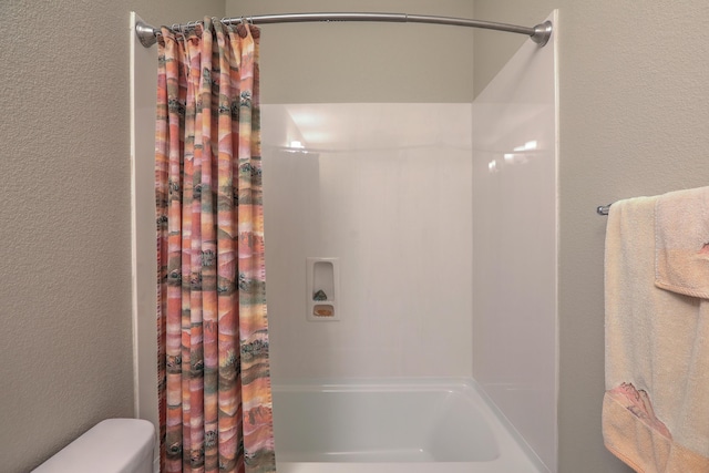 2952 Kings Canyon Loop NE, Rio Rancho, NM 87144 - full bathroom with shower / tub combo and a textured wall