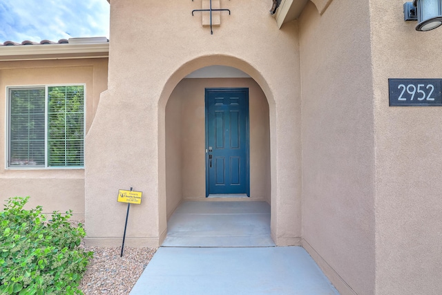 2952 Kings Canyon Loop NE, Rio Rancho, NM 87144 - view of exterior entry featuring stucco siding