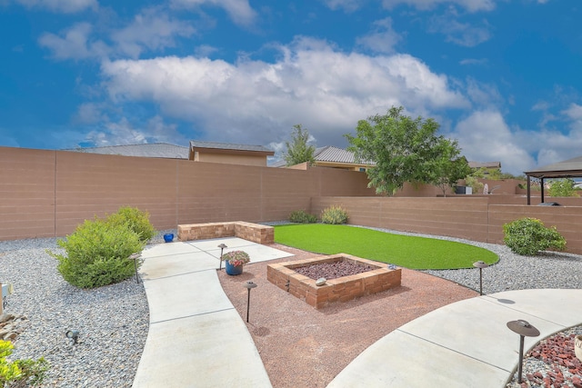 2952 Kings Canyon Loop NE, Rio Rancho, NM 87144 - fenced backyard with a patio area