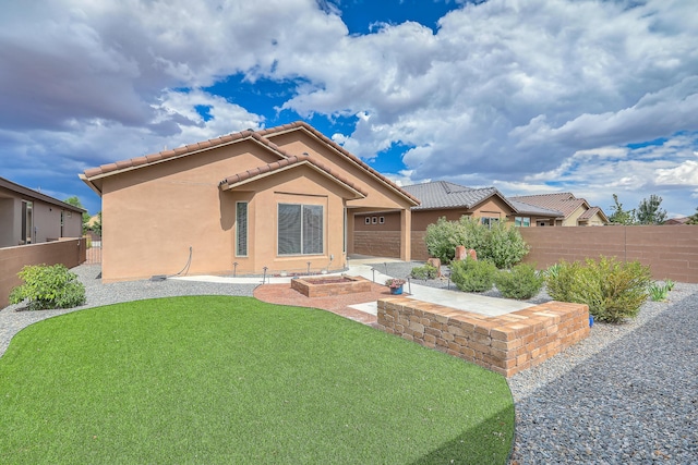 2952 Kings Canyon Loop NE, Rio Rancho, NM 87144 - rear view of property with a tiled roof and stucco siding