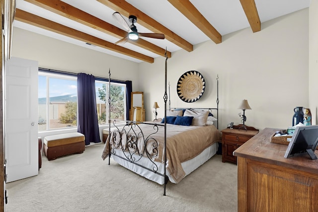 2504 Campeche Rd NE, Rio Rancho, NM 87144 - bedroom featuring light colored carpet and beam ceiling