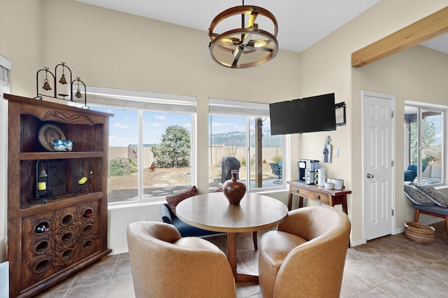 2504 Campeche Rd NE, Rio Rancho, NM 87144 - dining area with a chandelier, plenty of natural light, and light tile patterned floors