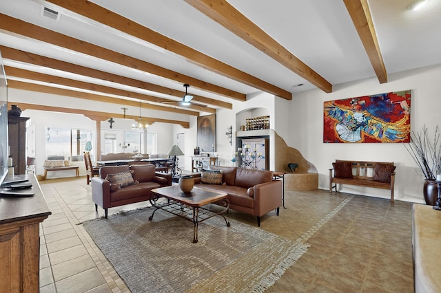 2504 Campeche Rd NE, Rio Rancho, NM 87144 - living room featuring beamed ceiling, a ceiling fan, and tile patterned floors