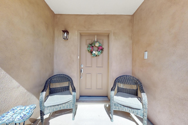2504 Campeche Rd NE, Rio Rancho, NM 87144 - doorway to property with stucco siding