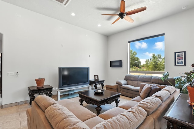 76 Otero Rd, Los Lunas, NM 87031 - living room with ceiling fan, recessed lighting, and light tile patterned flooring