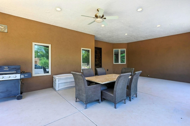 76 Otero Rd, Los Lunas, NM 87031 - view of patio featuring a grill, ceiling fan, and outdoor dining area