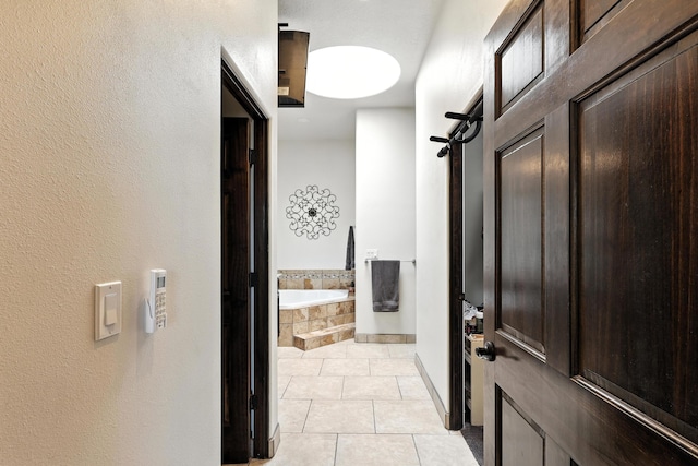76 Otero Rd, Los Lunas, NM 87031 - hall with light tile patterned flooring