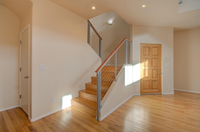 315 11th St SW, Albuquerque, NM 87102 - stairs featuring wood finished floors and recessed lighting