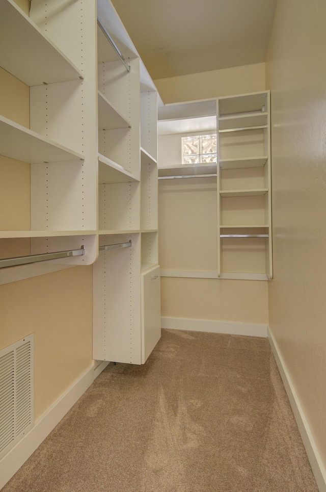 315 11th St SW, Albuquerque, NM 87102 - spacious closet featuring carpet