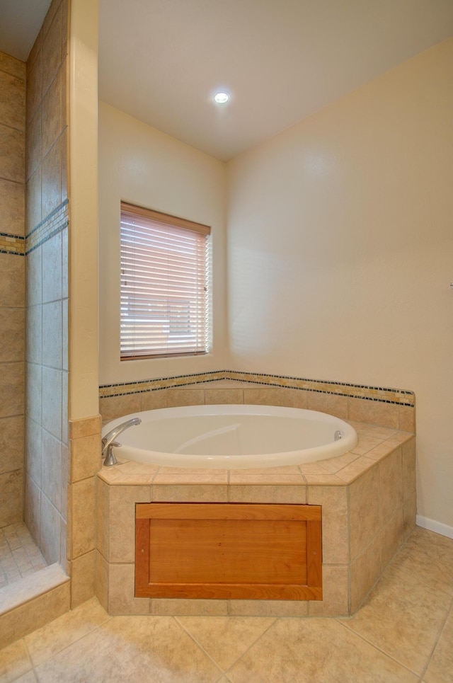 315 11th St SW, Albuquerque, NM 87102 - bathroom featuring tile patterned floors, a bath, a tile shower, and recessed lighting