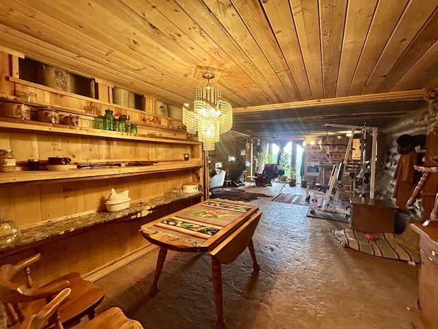 miscellaneous room featuring wood ceiling and a chandelier