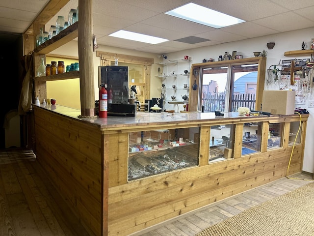 welcome area with a drop ceiling