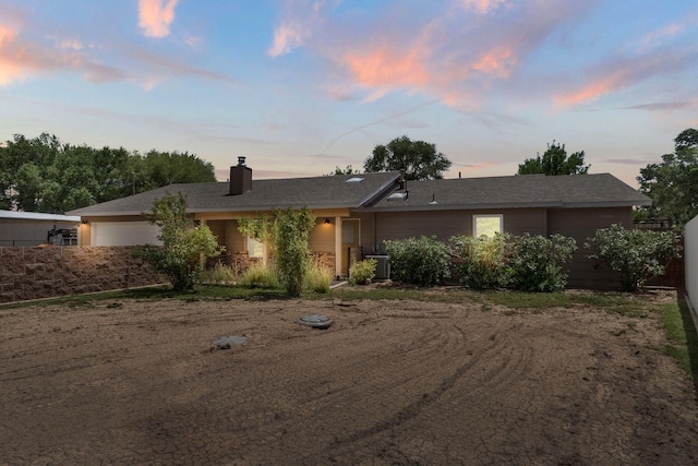 36 Palomas Rd, Los Lunas, NM 87031 - single story home featuring a chimney and a garage